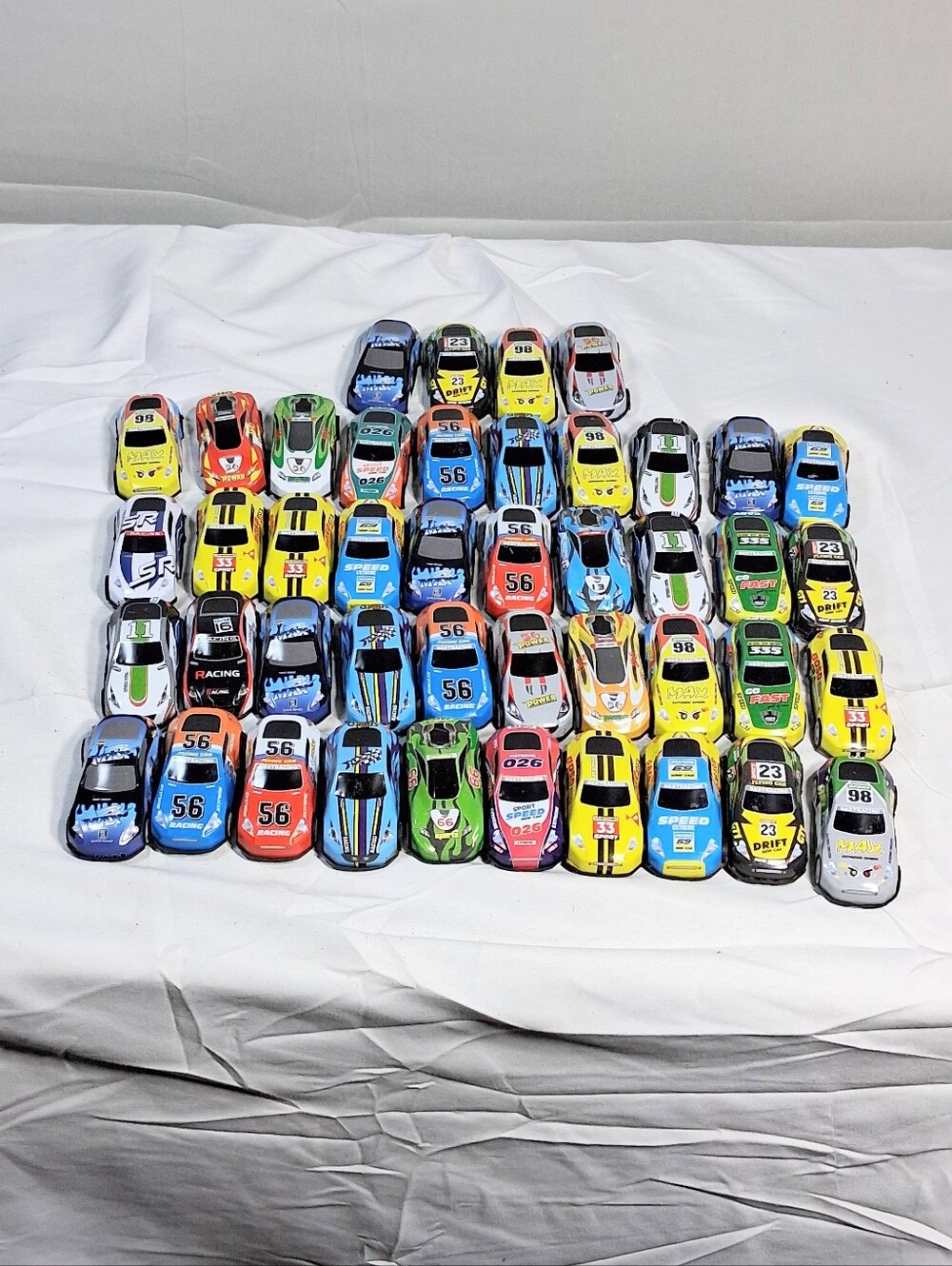 Count Of 44 Lightweight 2.5" Racing Cars in Carrying Case